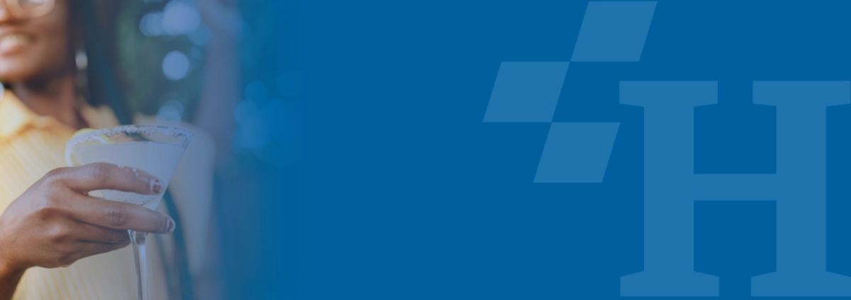 Image of a person holding a cocktail